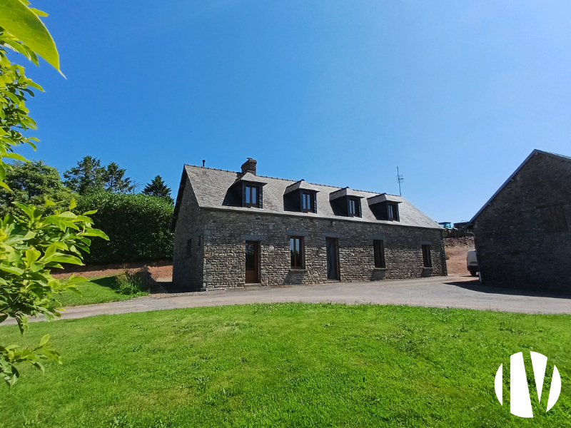 Melk en akkerbouw in het westen van Calvados - 